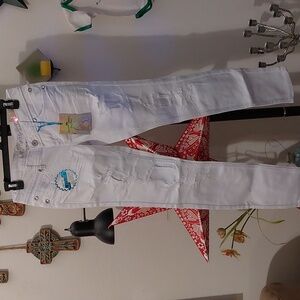 Y2K era jeans bleached almost white with rhinestones and destroyed details